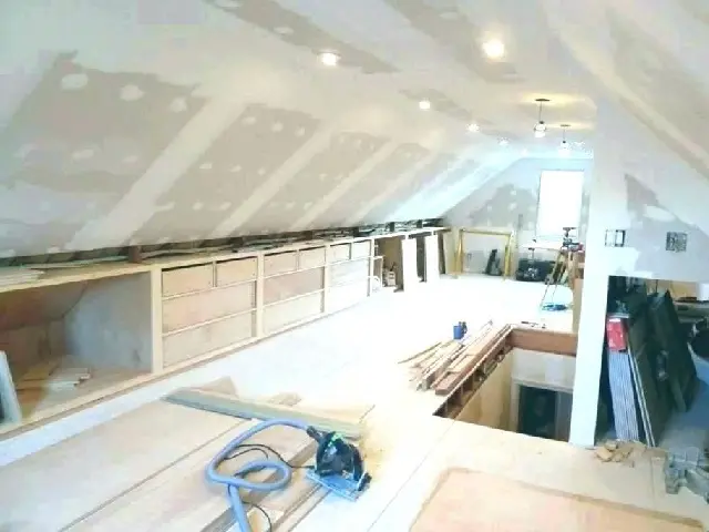 Attic conversion into living space with modern finishes