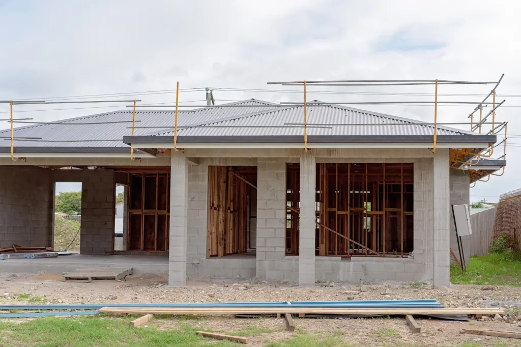 Block-and-truss shell of a home under its new roof