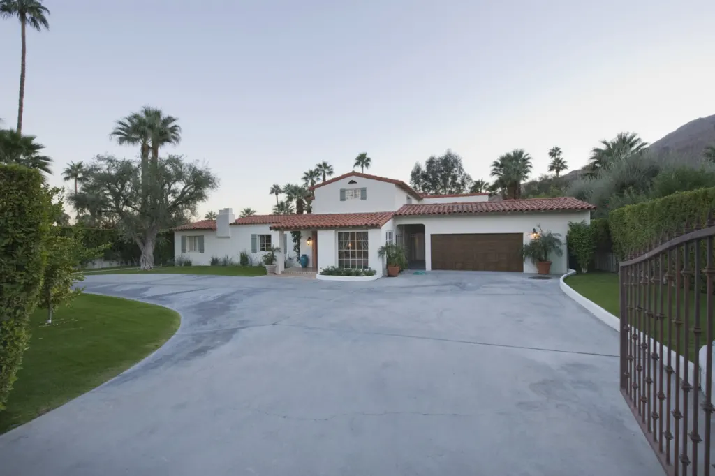Wide driveway and entry gate of a Miami home