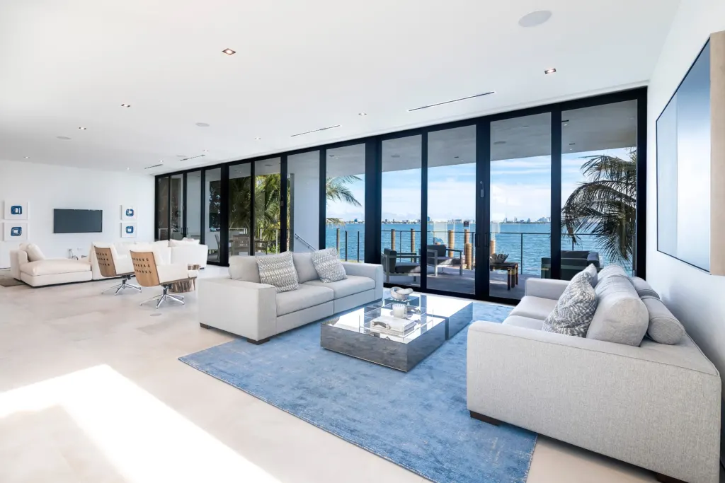 Bright white waterfront living room after an interior repaint