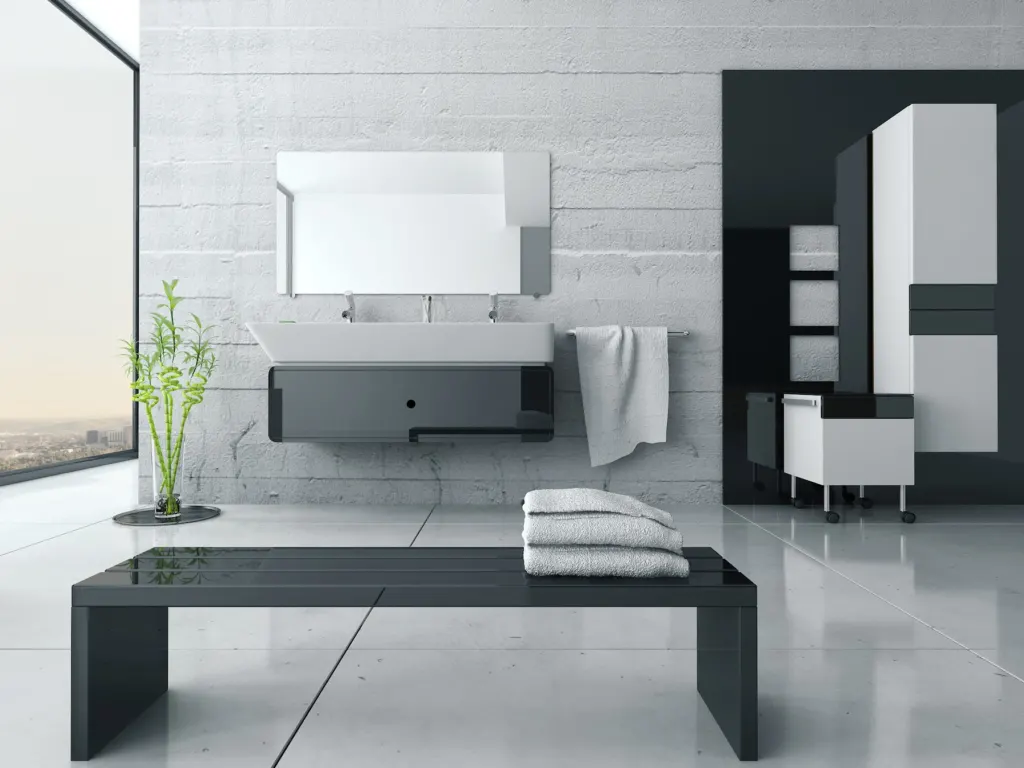 Grey large-format tile floor and wall in a modern bathroom